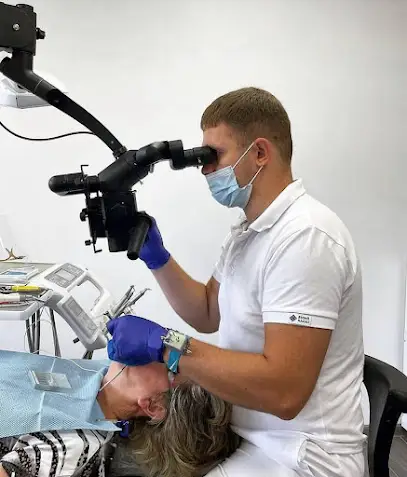 Стоматологія Голосієво - Brovchak Family Dental Care. Лікування зубів під мікроскопом.