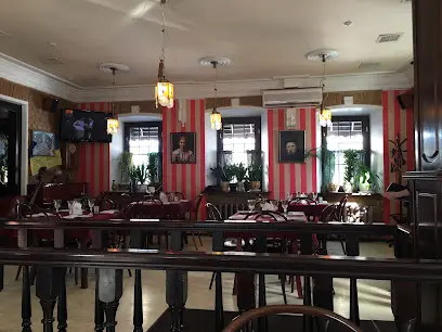 Біля каміну