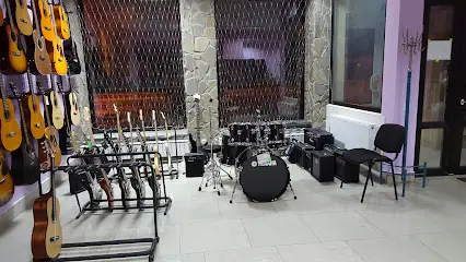 Музика Плюс